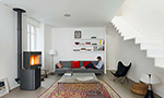 In situ image of Stûv P-10 - Photo: Daniel Moulinet - Architects : Agence Roulle-Oliveira - Pellet stove installed by Ambiance Chaleur Nîmes
